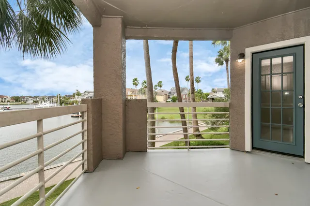 a view of a hallway with a white walls