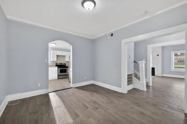 a view of washer and dryer with wooden floor