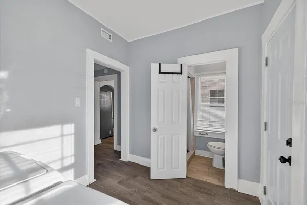 a bathroom with a bathtub and shower