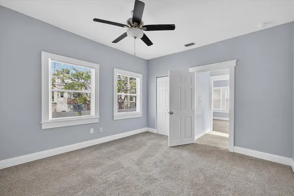 a view of an empty room with a window