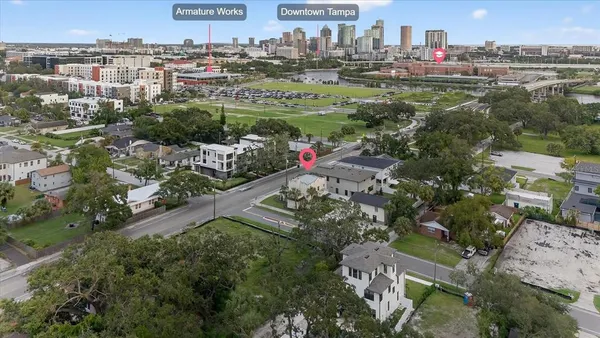 an aerial view of a city with lots of residential buildings