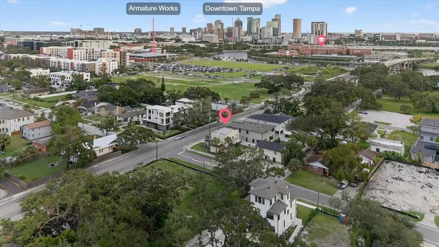an aerial view of a city with lots of residential buildings
