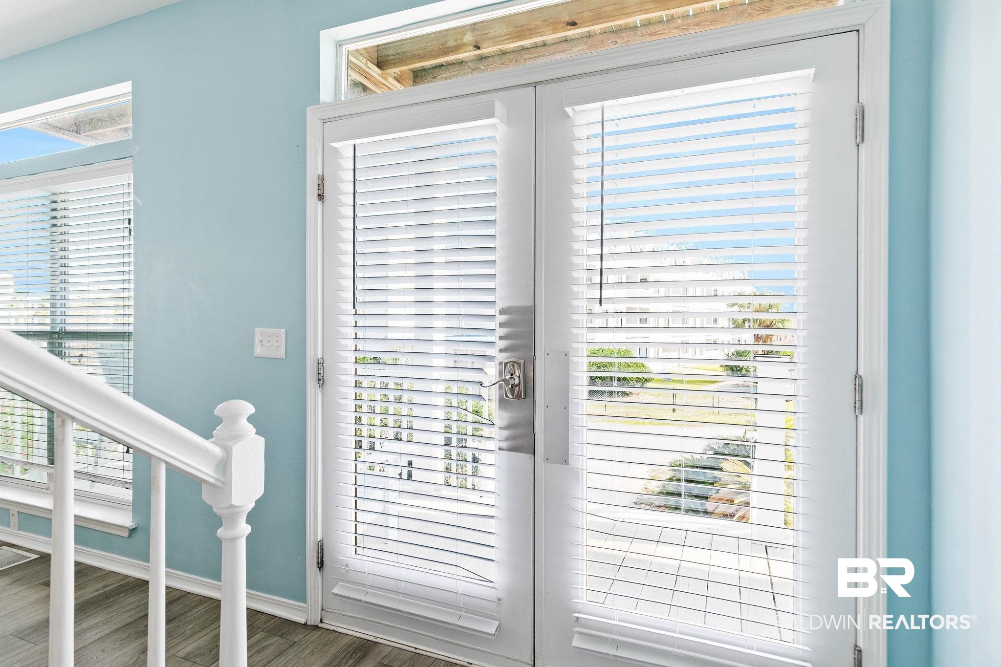 545 Plantation Road, Unit 3 Gulf Shores, AL 36542 - Photo 6 of 54 Entryway with wood finished floors and baseboards