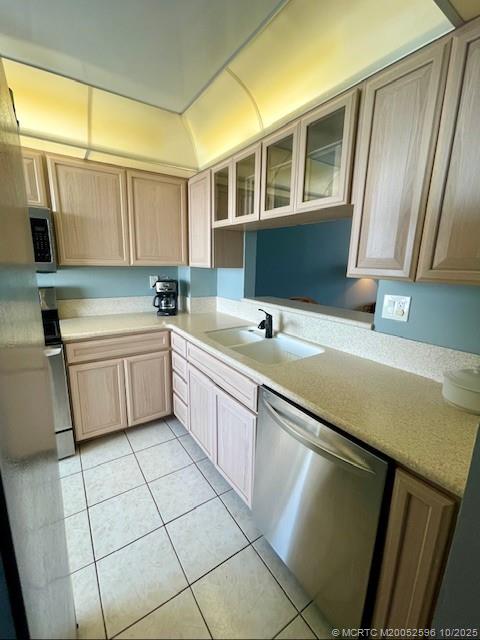 10680 South Ocean Drive, Unit 1005 Jensen Beach, FL 34957 - Photo 12 of 42 a kitchen with a sink cabinets and window