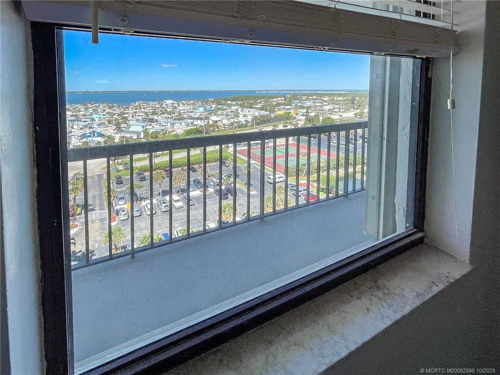 10680 South Ocean Drive, Unit 1005 Jensen Beach, FL 34957 - Photo 15 of 42 a view of a large window with an outdoor space