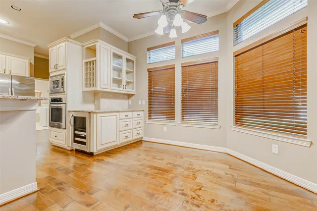 a view of a bedroom with windows