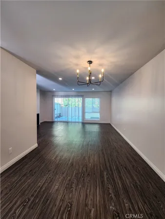 a view of a room that has a large window