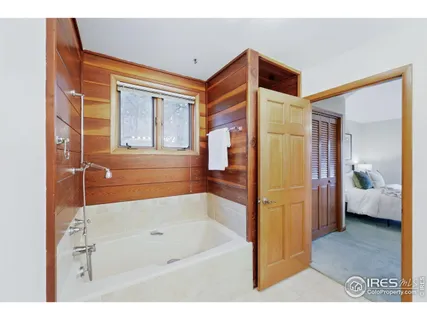 a view of an empty room with windows