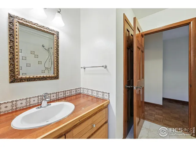 a kitchen with stainless steel appliances a refrigerator sink and cabinets