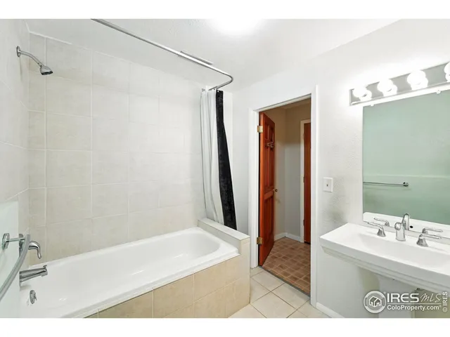 a view of outdoor space with garden and trees