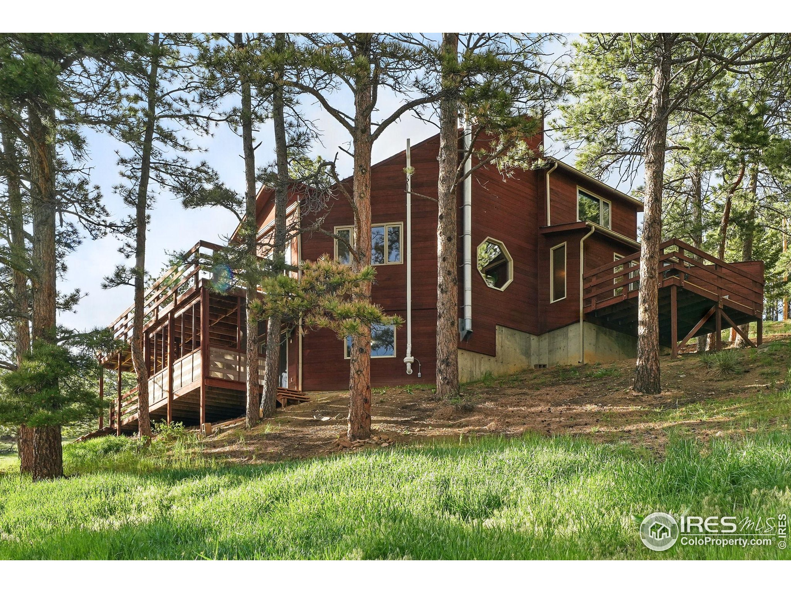 1101 Peakview Circle Boulder, CO 80302 - Photo 36 of 37 a view of outdoor space with garden and trees