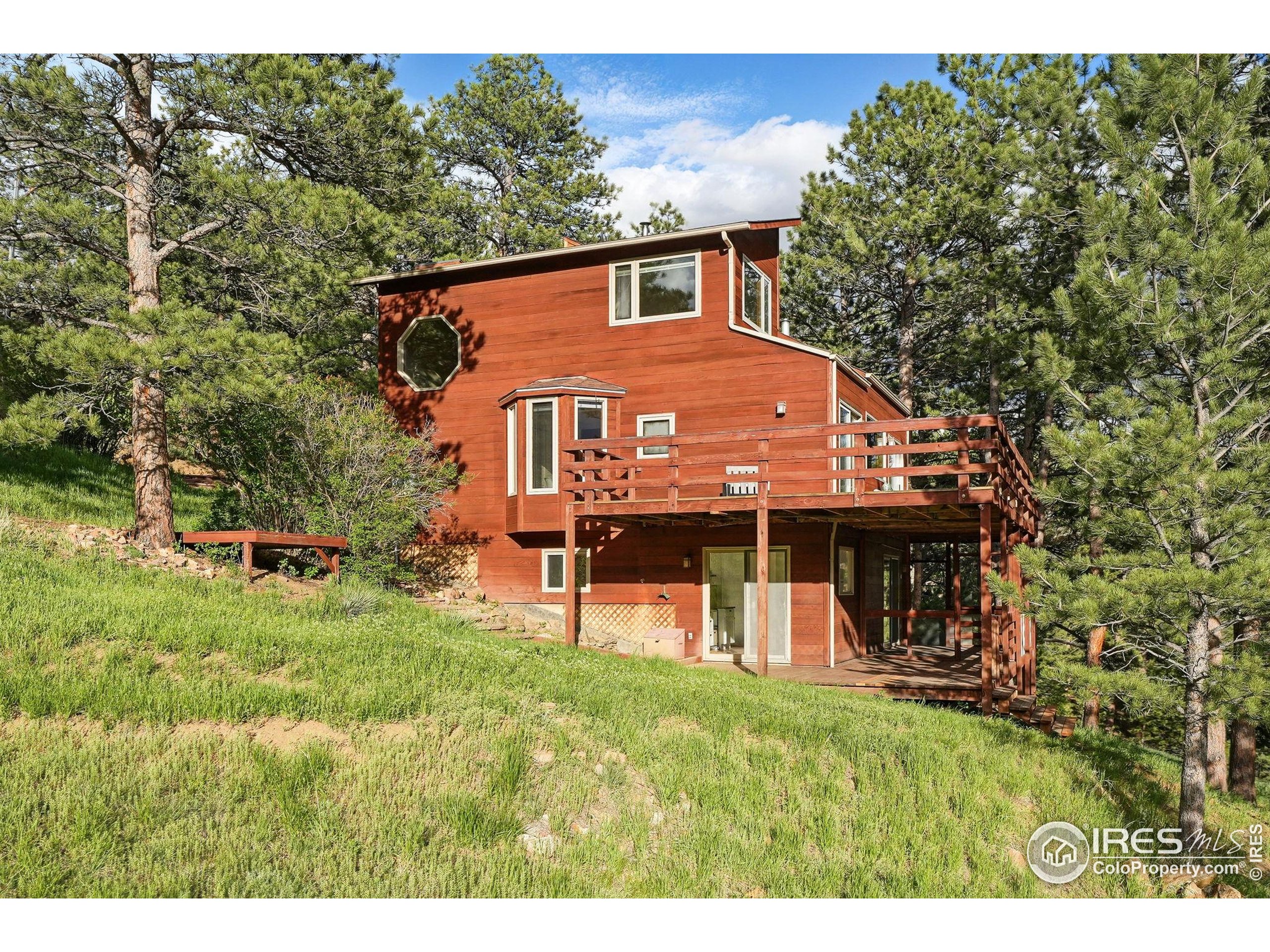 1101 Peakview Circle Boulder, CO 80302 - Photo 5 of 37 a view of a house with a yard balcony and sitting area
