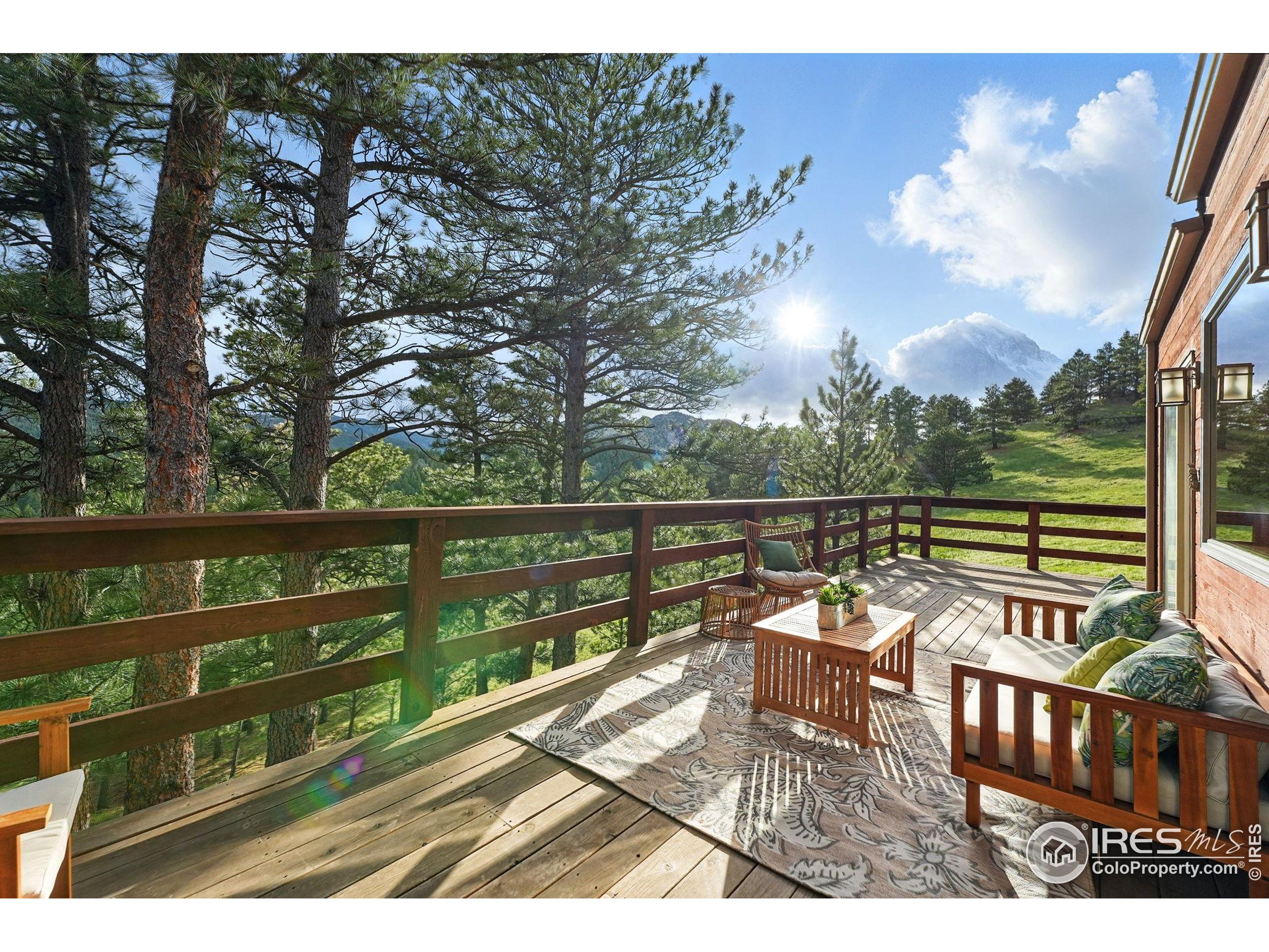 1101 Peakview Circle Boulder, CO 80302 - Photo 10 of 37 a view of a chairs in a balcony