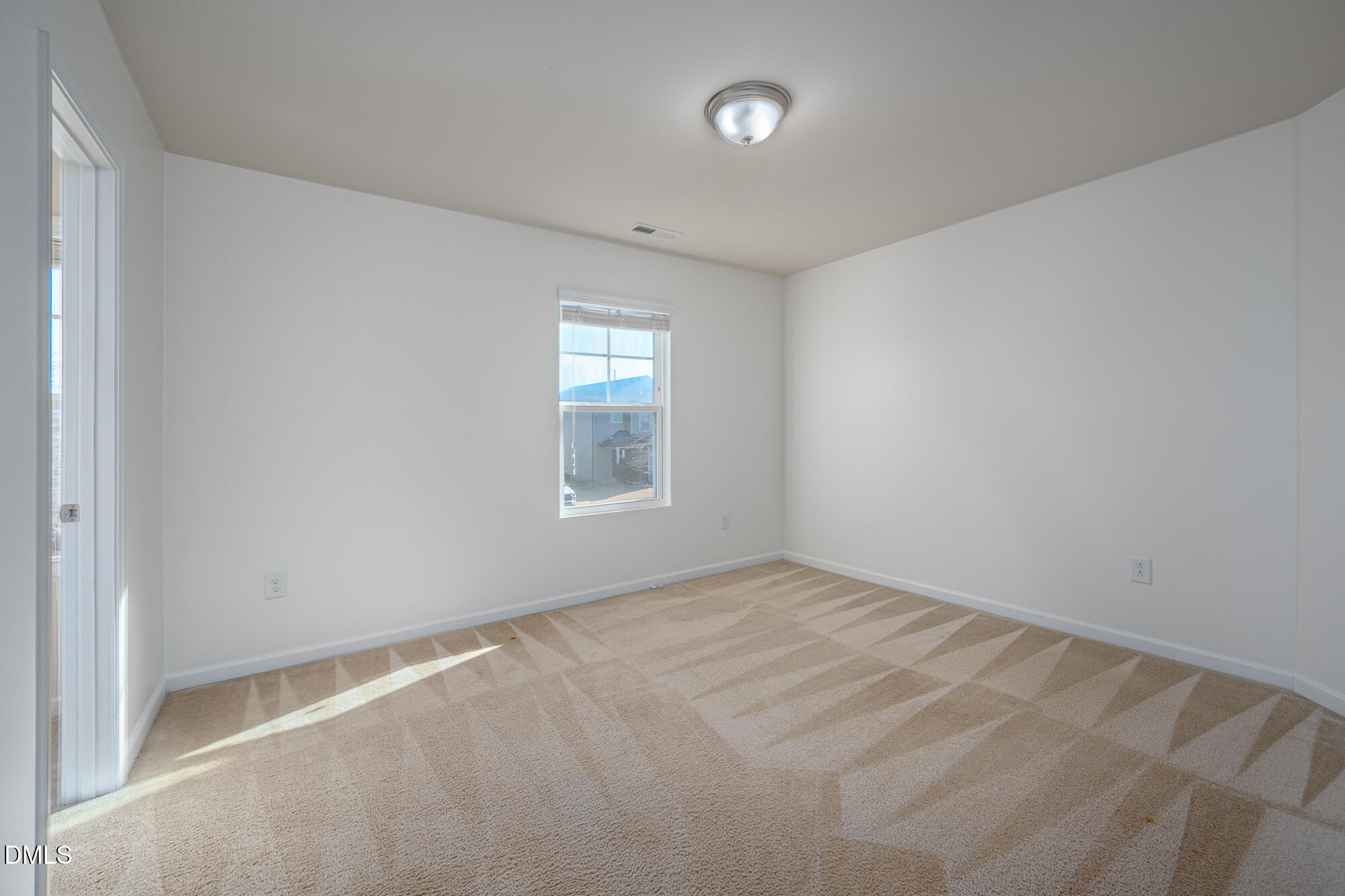 3548 Althorp Drive Raleigh, NC 27616 - Photo 29 of 56 an empty room with windows