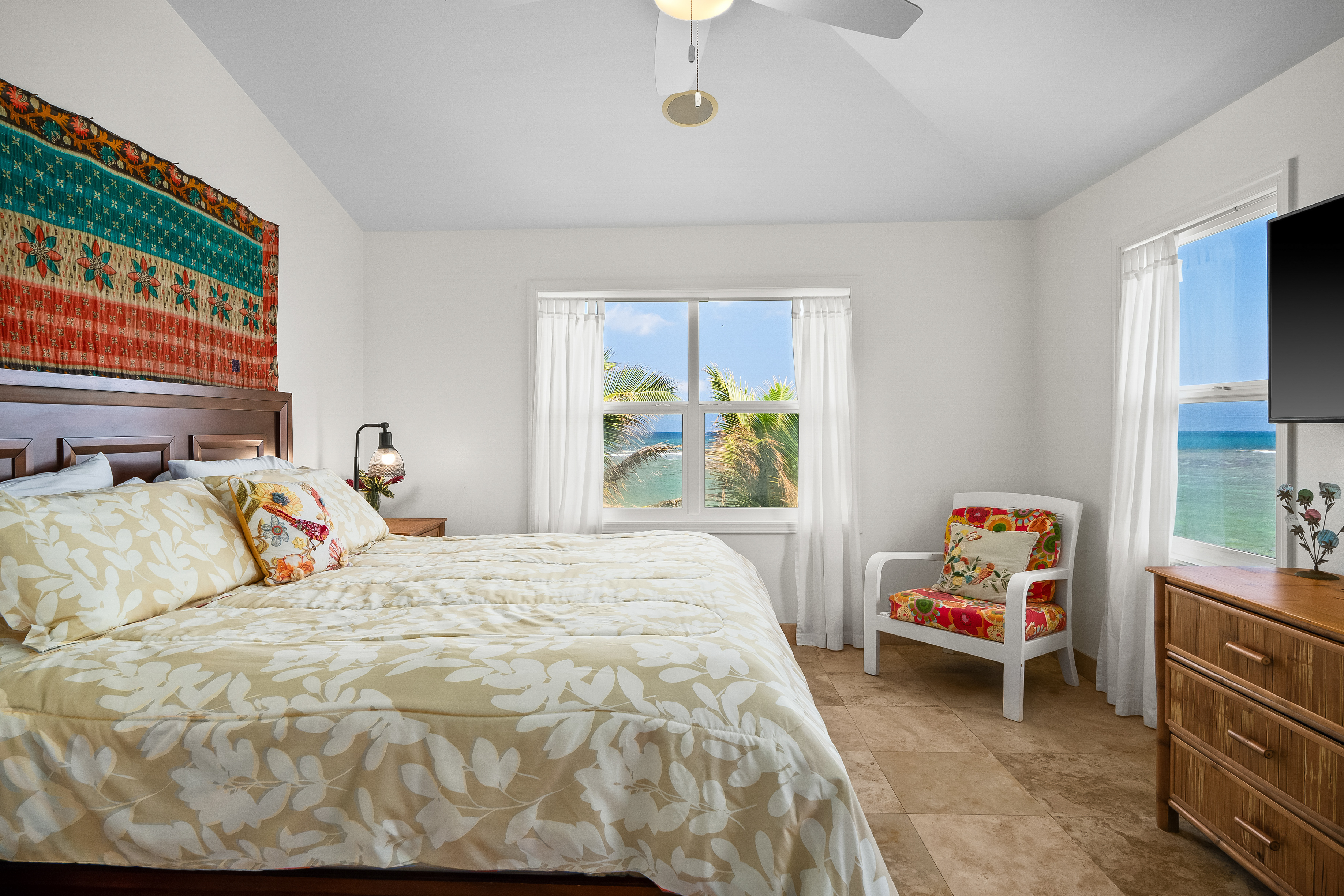 4910 Aliomanu Road Anahola, HI 96703 - Photo 16 of 30 a bedroom with a bed and a window
