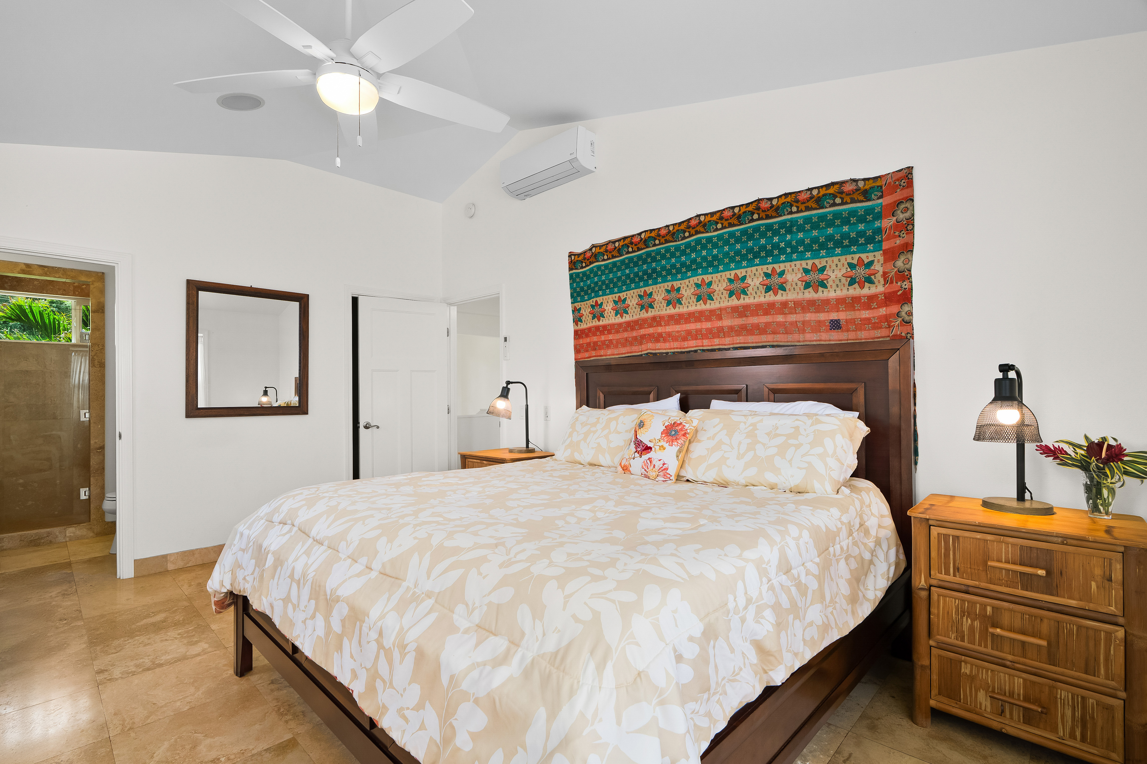 4910 Aliomanu Road Anahola, HI 96703 - Photo 17 of 30 a bedroom with a bed and a dresser