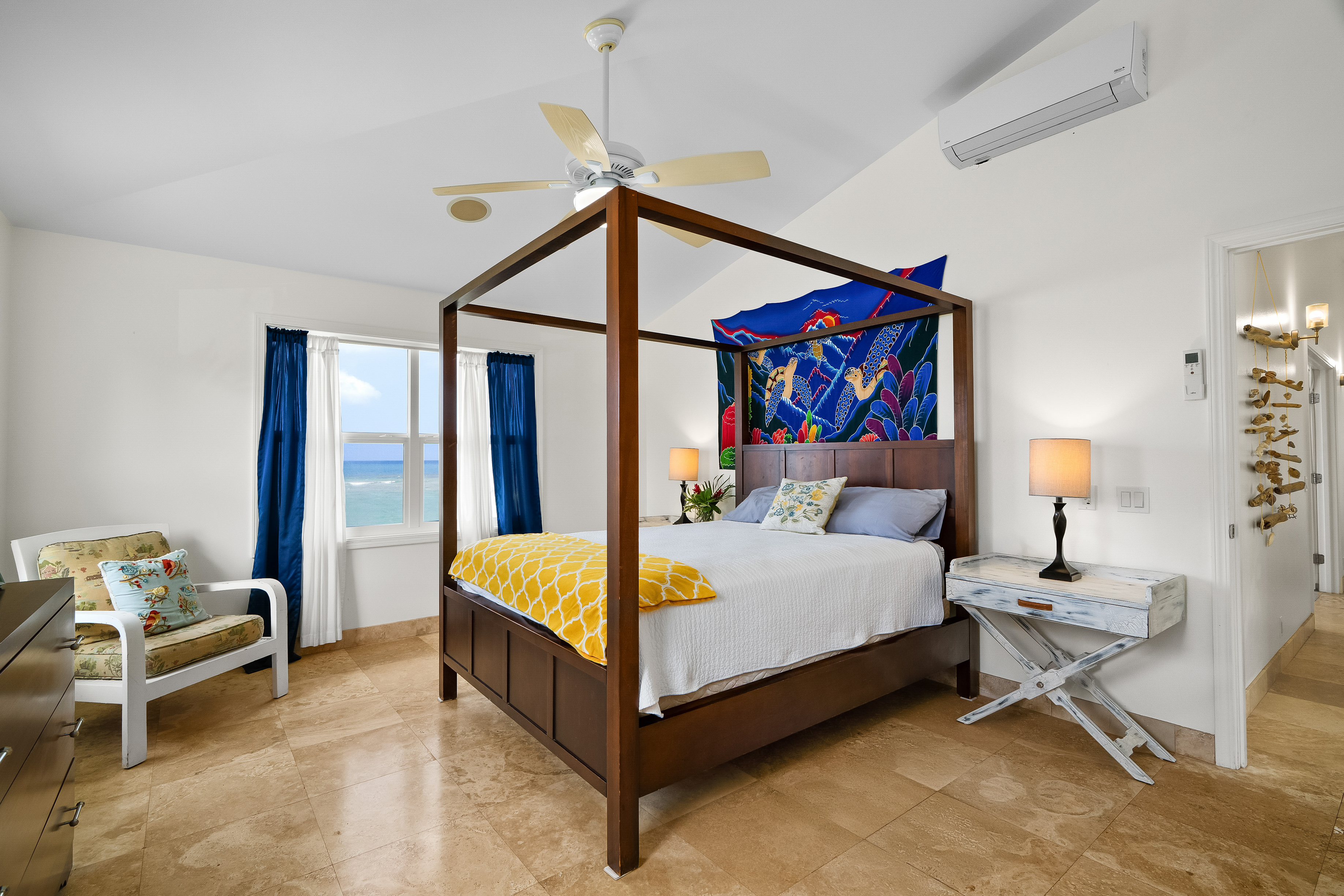 4910 Aliomanu Road Anahola, HI 96703 - Photo 20 of 30 a bedroom with a bed and a window