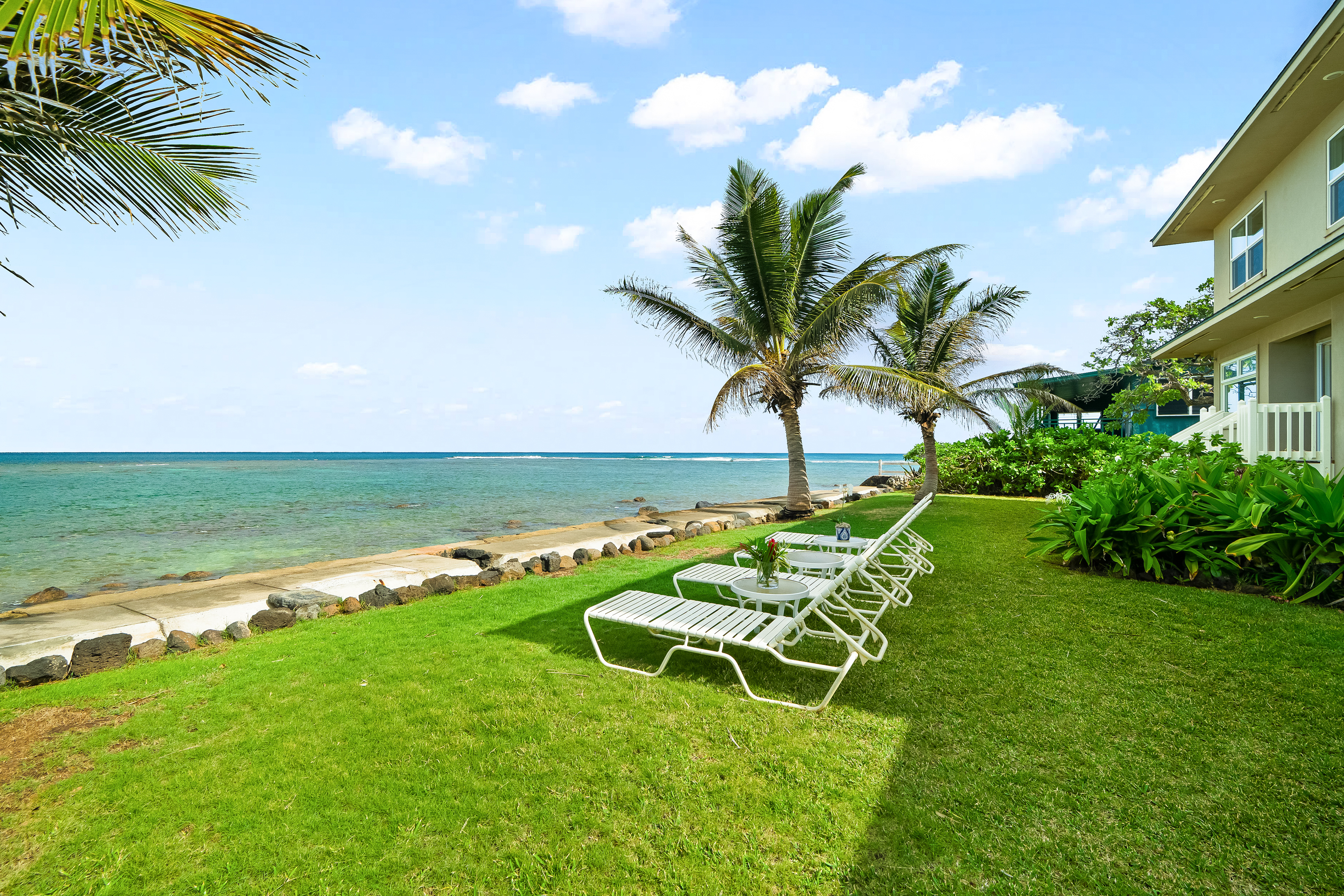 4910 Aliomanu Road Anahola, HI 96703 - Photo 27 of 30 a garden with a table and chairs