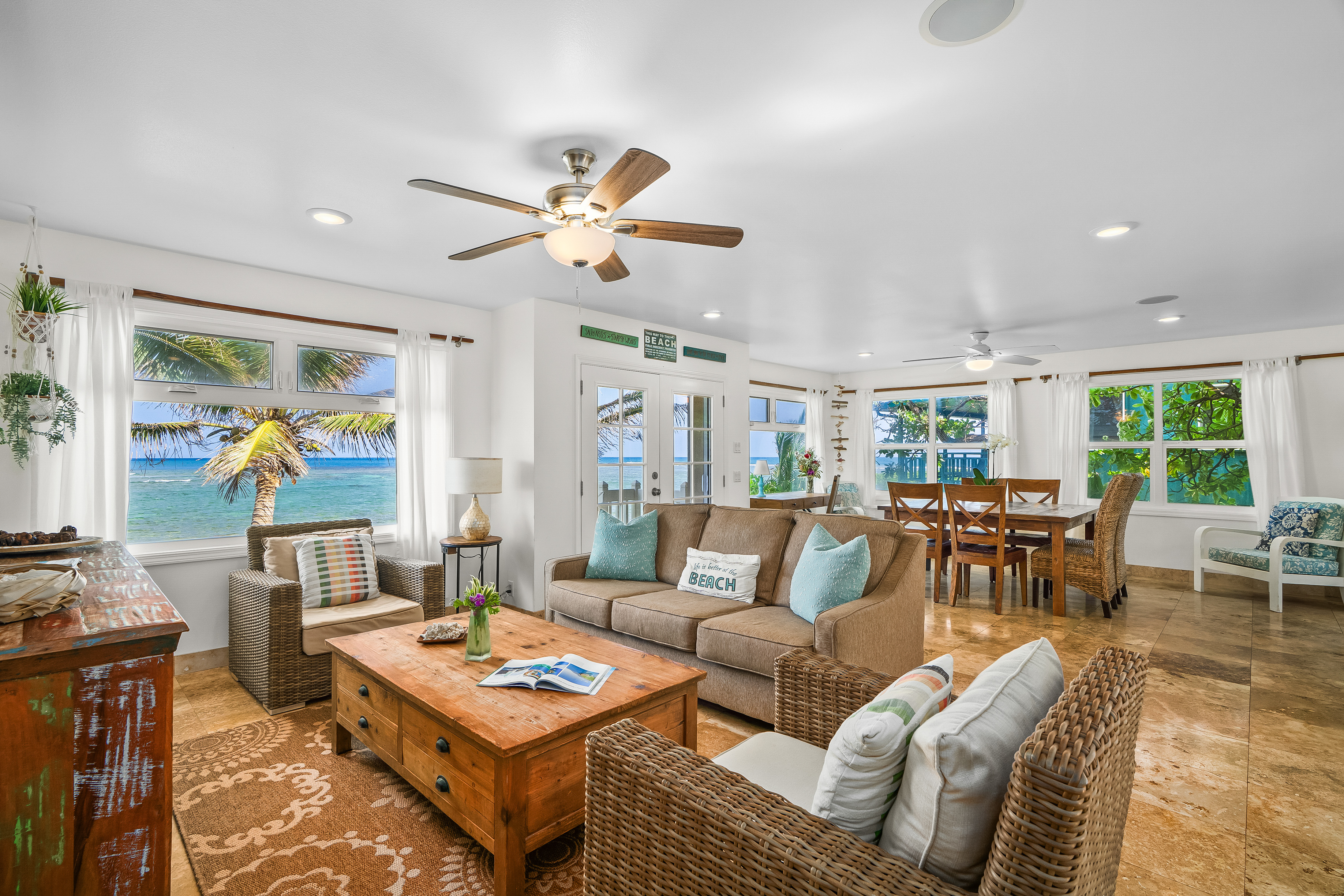 4910 Aliomanu Road Anahola, HI 96703 - Photo 3 of 30 a living room with furniture a rug and a window
