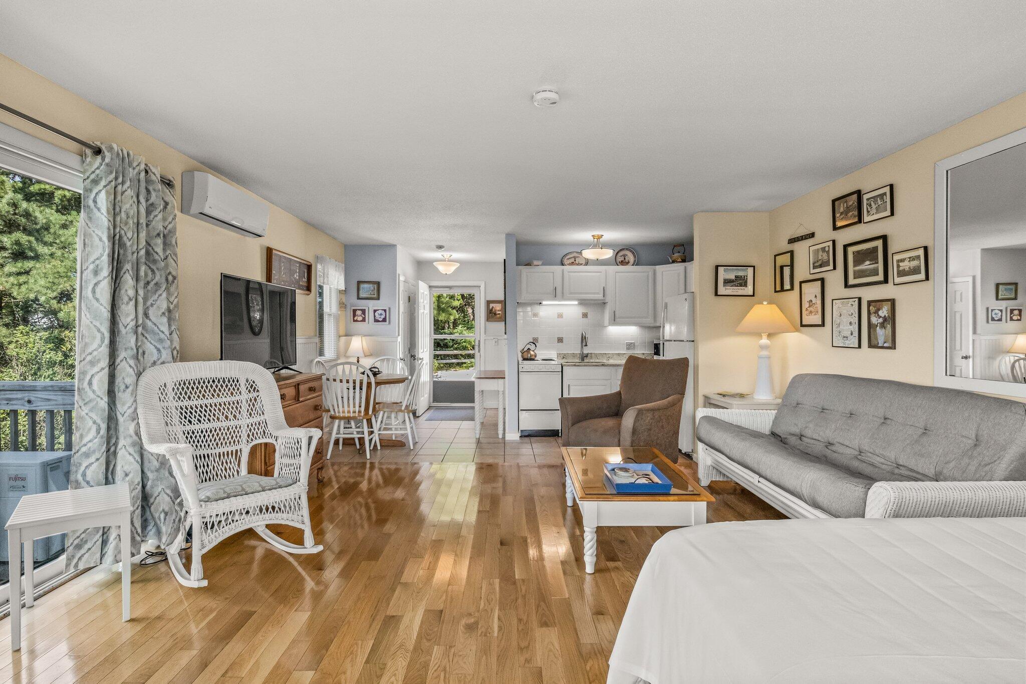 132 Shore Road, Unit 31 Truro, MA 02666 - Photo 13 of 24 a living room with furniture and a flat screen tv