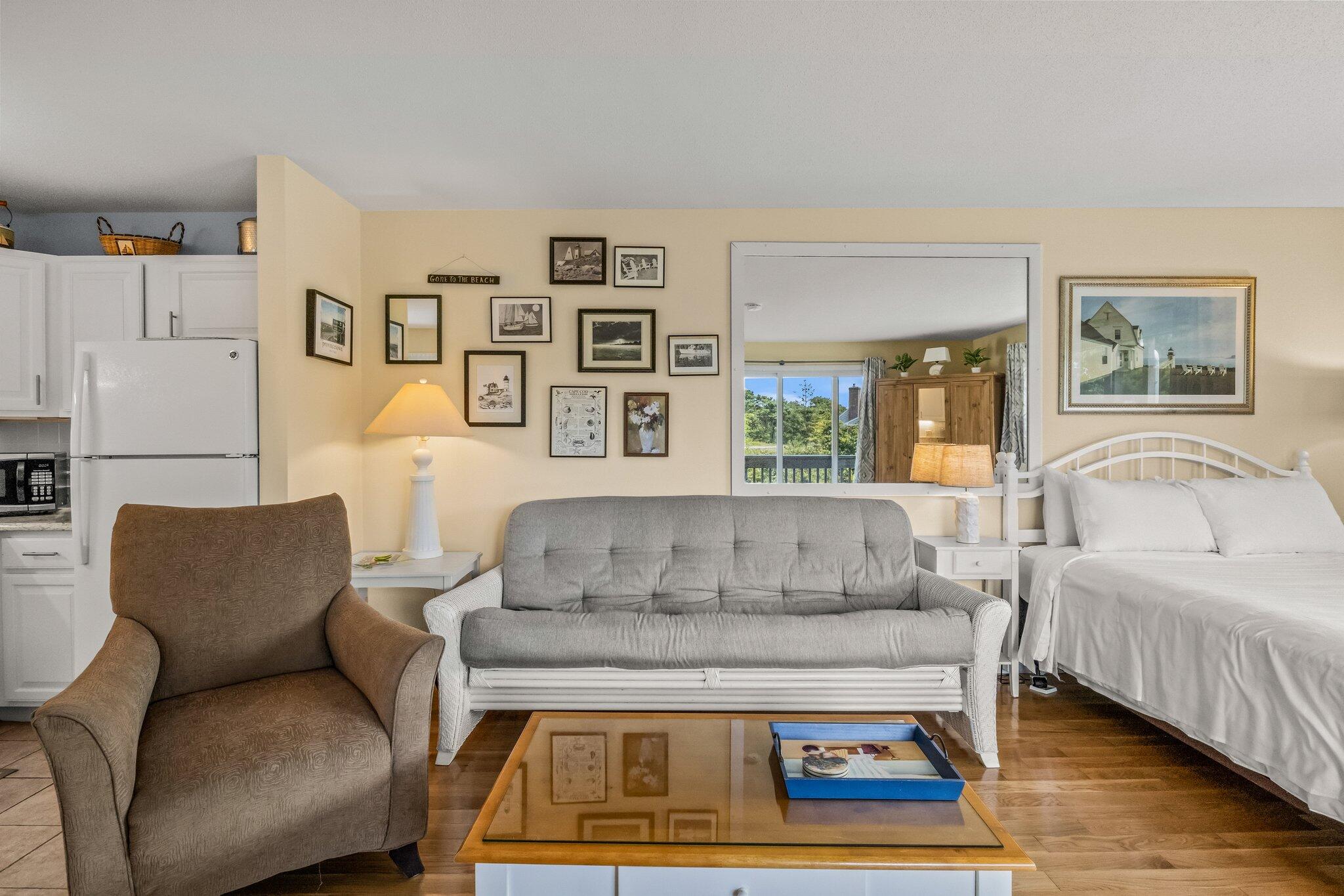 132 Shore Road, Unit 31 Truro, MA 02666 - Photo 17 of 24 a living room with furniture and a couch