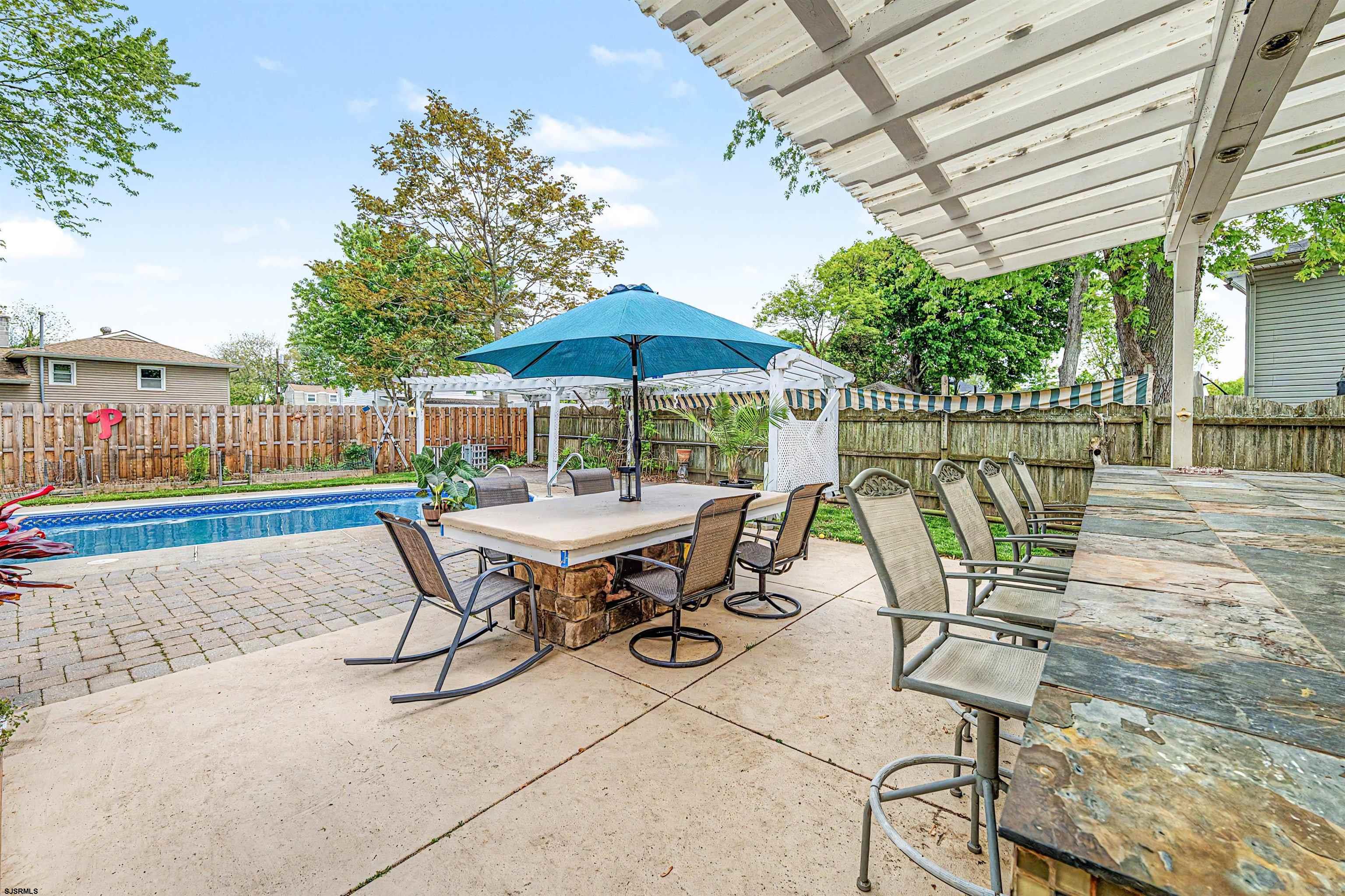 125 Exton Road Somers Point, NJ 08244 - Photo 25 of 35 a view of a table and chairs in patio