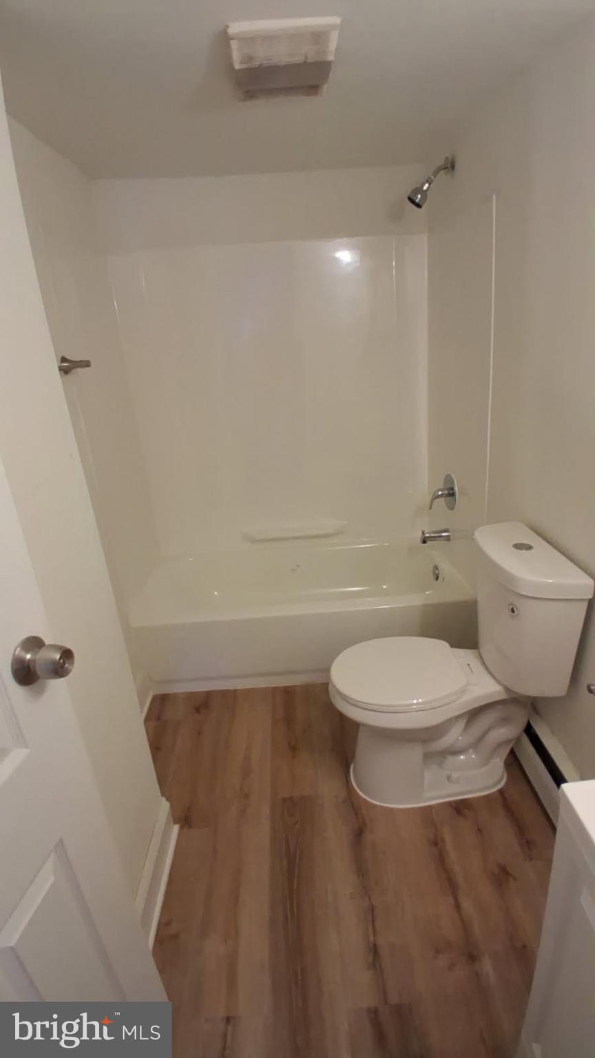 334 Middlesex Street Gloucester City, NJ 08030 - Photo 11 of 12 a bathroom with a toilet and a shower