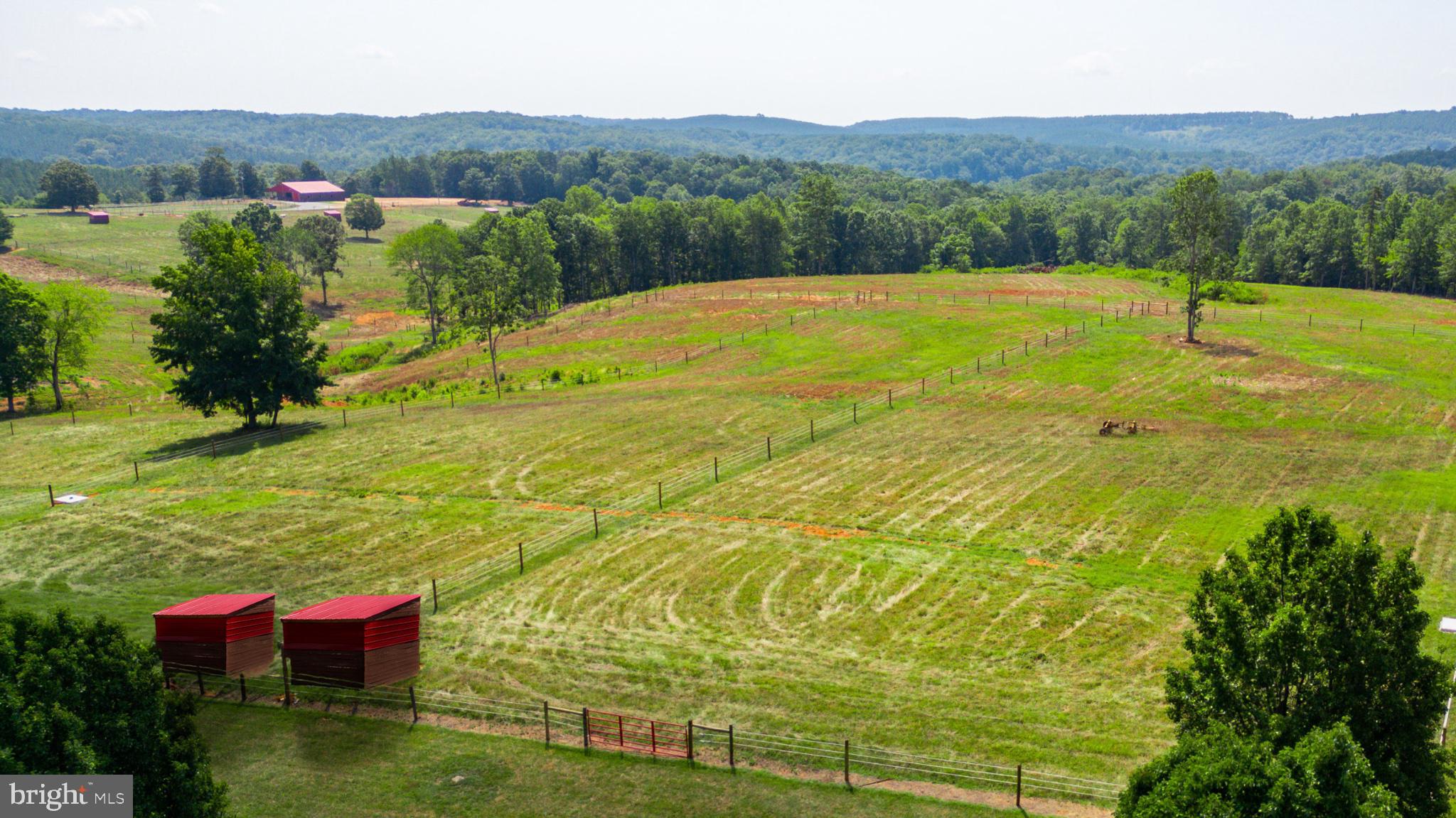 1 B Easome Road Hurt, VA 24563 - Photo 14 of 16 Expansive green fields under blue skies.