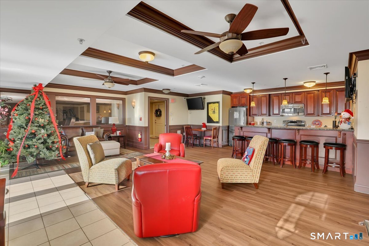 461 Bank Street, Unit 606 New London, CT 06320 - Photo 14 of 37 Plush seating and flat screen TVs.