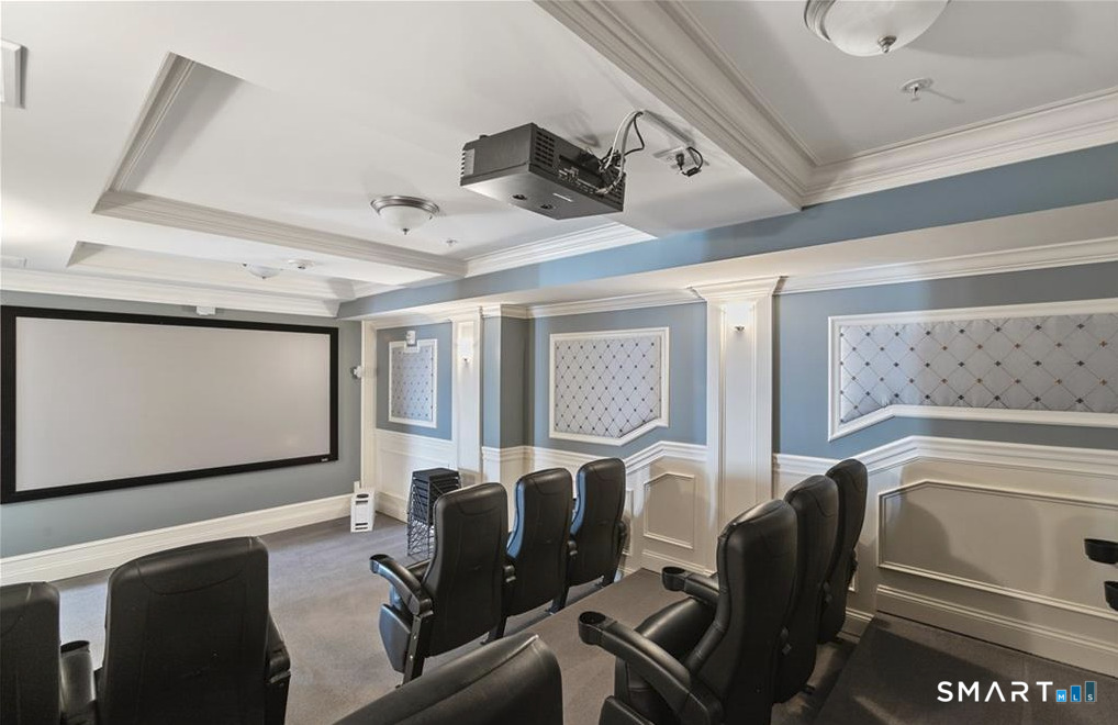 461 Bank Street, Unit 606 New London, CT 06320 - Photo 25 of 35 a room with furniture and flat screen tv