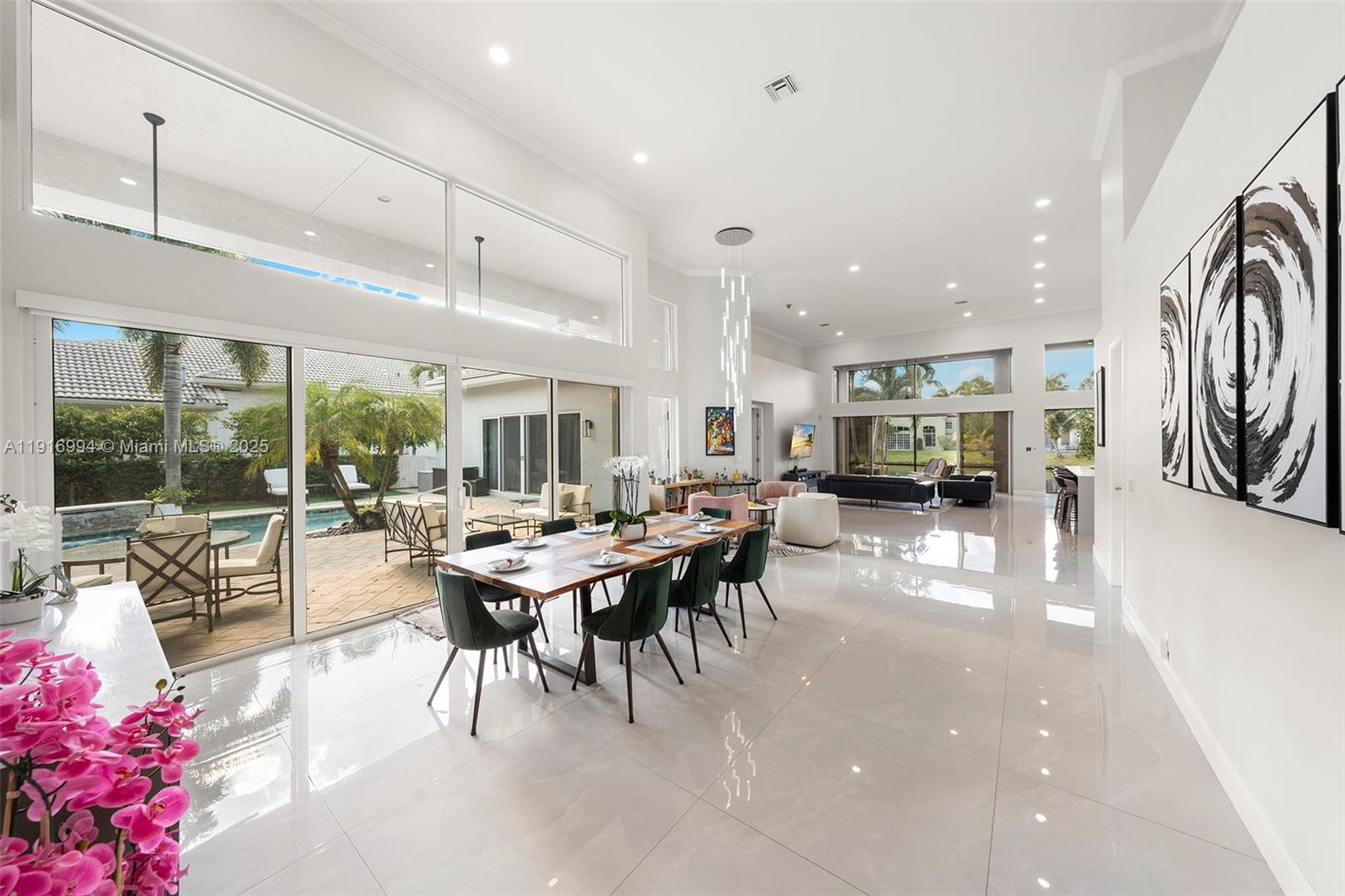 6451 Northwest 32nd Way Boca Raton, FL 33496 - Photo 14 of 54 a view of a dining area with furniture window and outside view