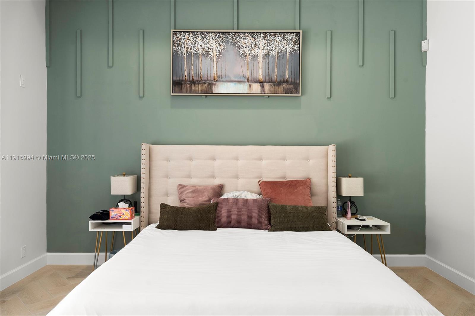 6451 Northwest 32nd Way Boca Raton, FL 33496 - Photo 20 of 54 a bedroom with a bed and a painting on the wall