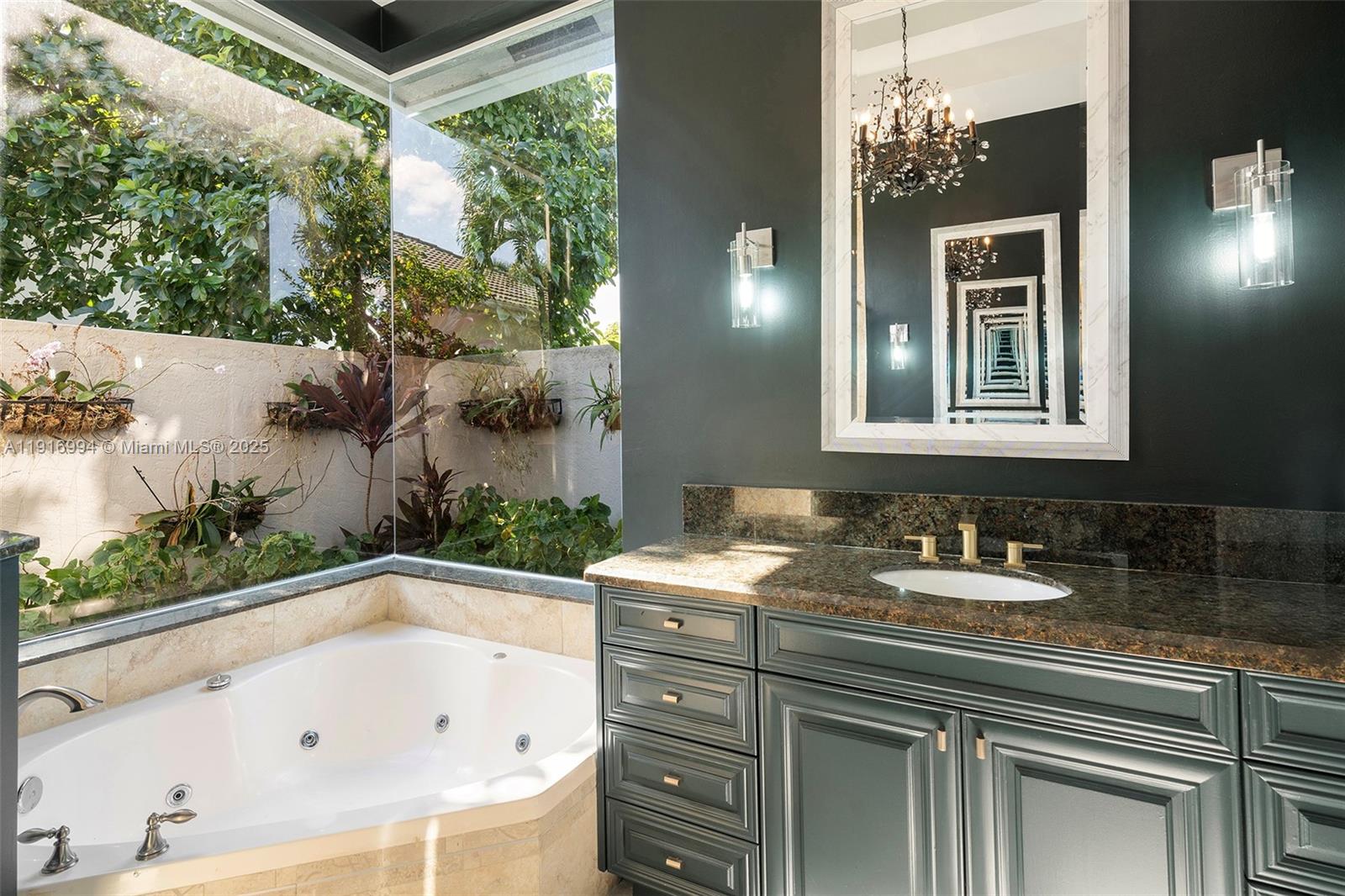 6451 Northwest 32nd Way Boca Raton, FL 33496 - Photo 22 of 54 a bathroom with a bathtub and a sink