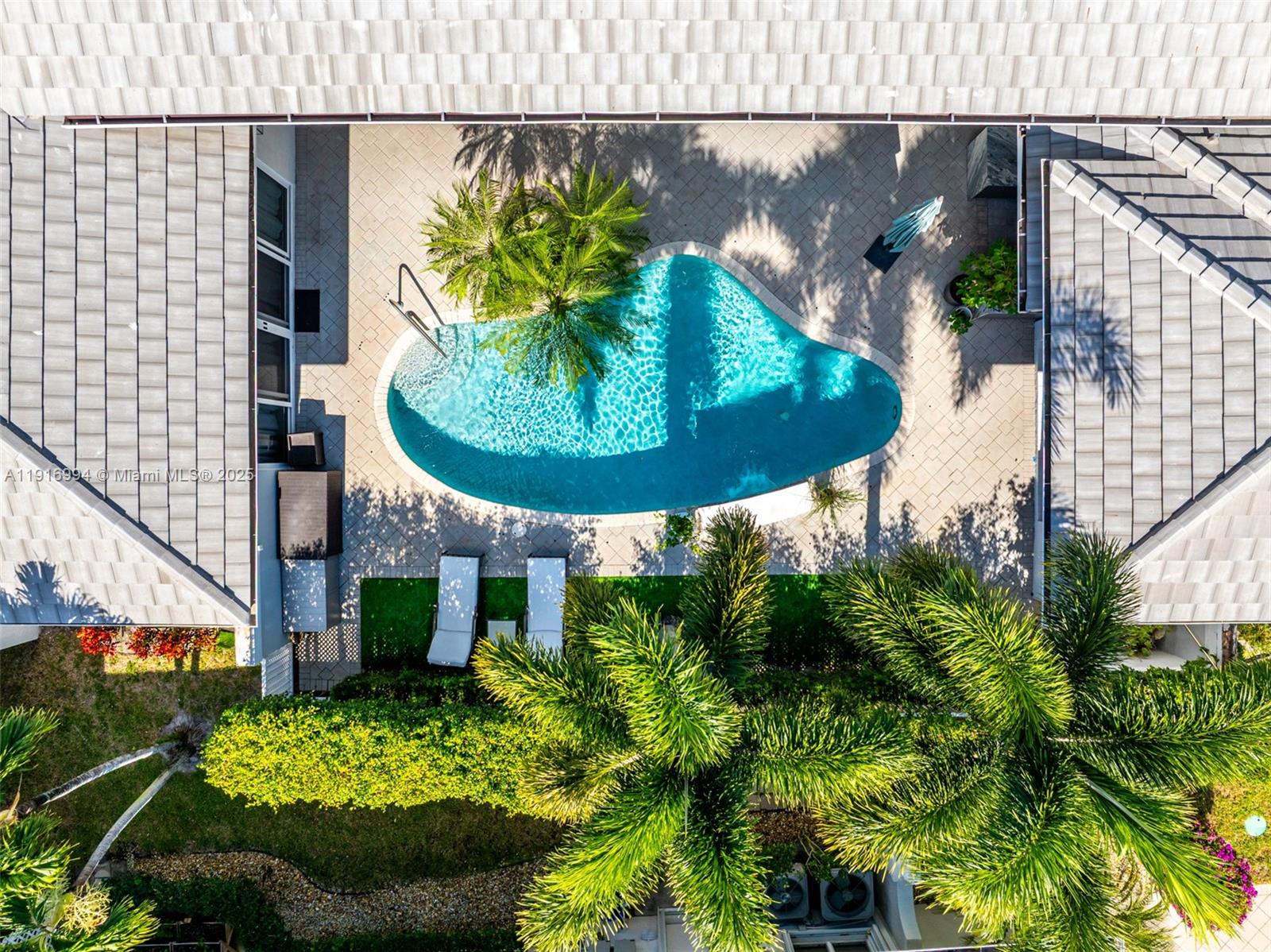 6451 Northwest 32nd Way Boca Raton, FL 33496 - Photo 28 of 54 an aerial view of a house