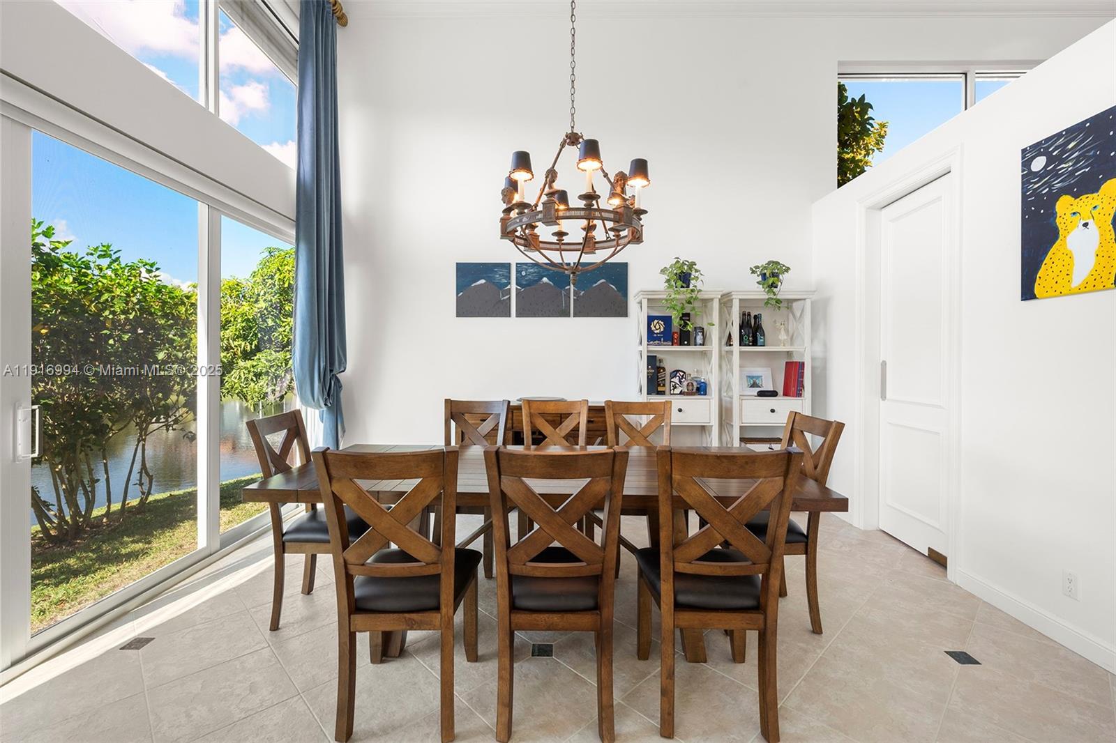 6451 Northwest 32nd Way Boca Raton, FL 33496 - Photo 31 of 54 a view of a dining room with furniture window and outside view