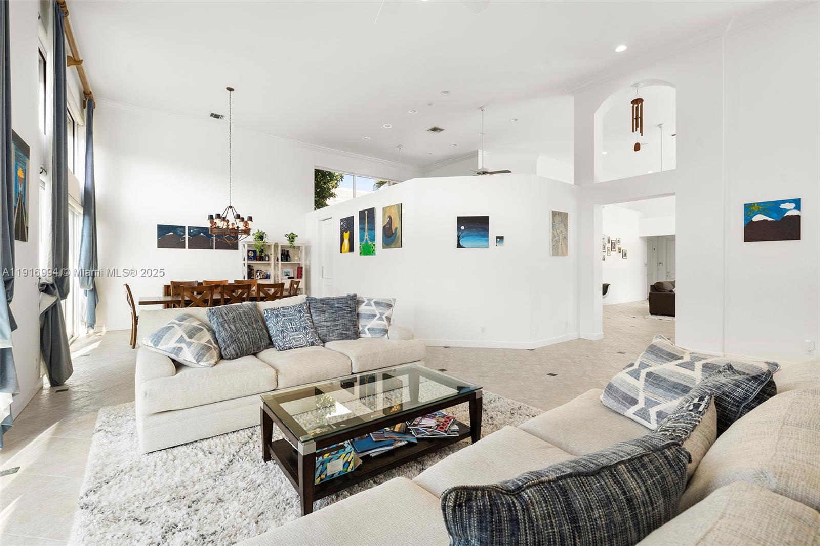 6451 Northwest 32nd Way Boca Raton, FL 33496 - Photo 34 of 54 a living room with furniture and wooden floor