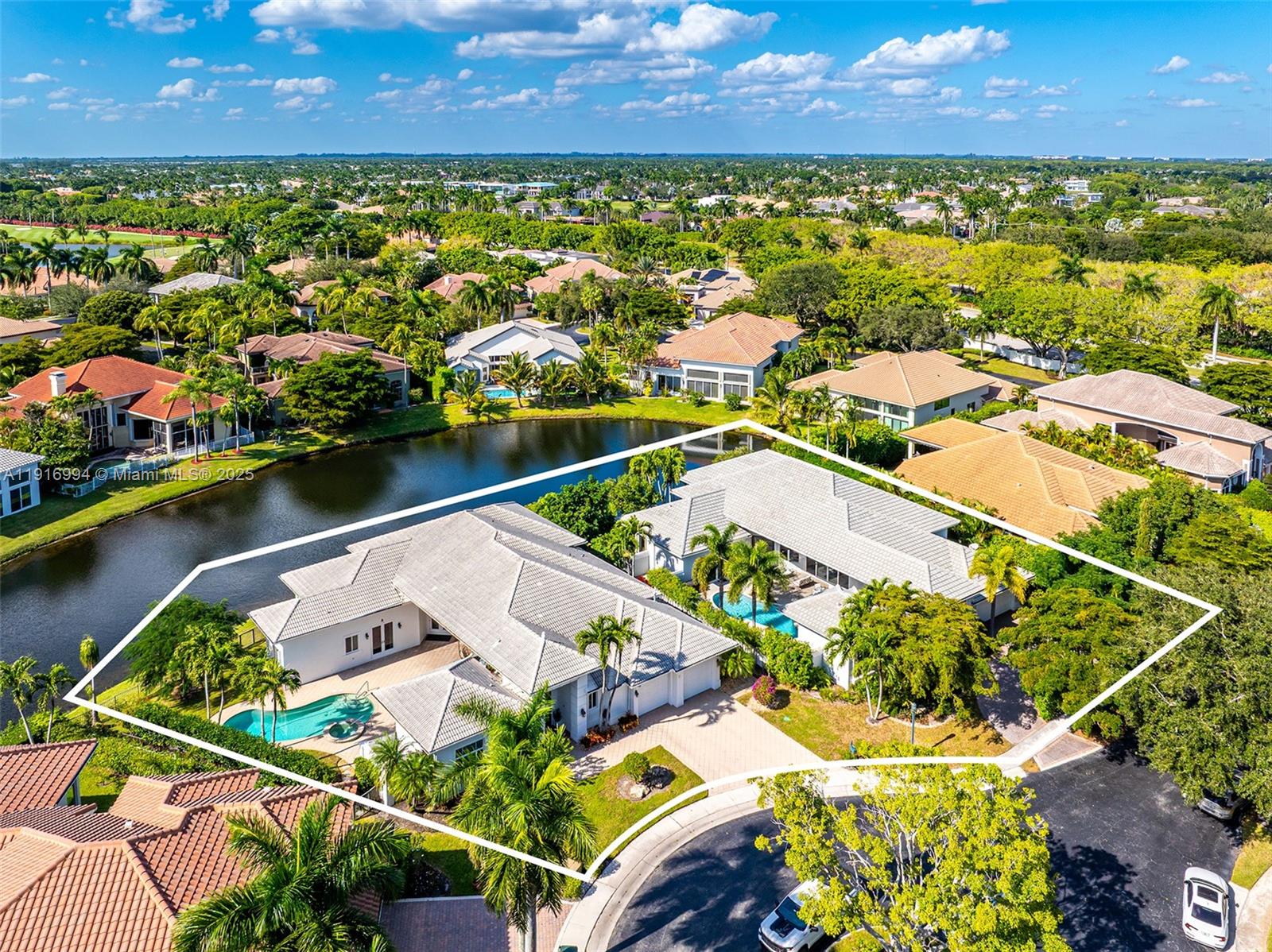 6451 Northwest 32nd Way Boca Raton, FL 33496 - Photo 7 of 54 an aerial view of a house with a lake view
