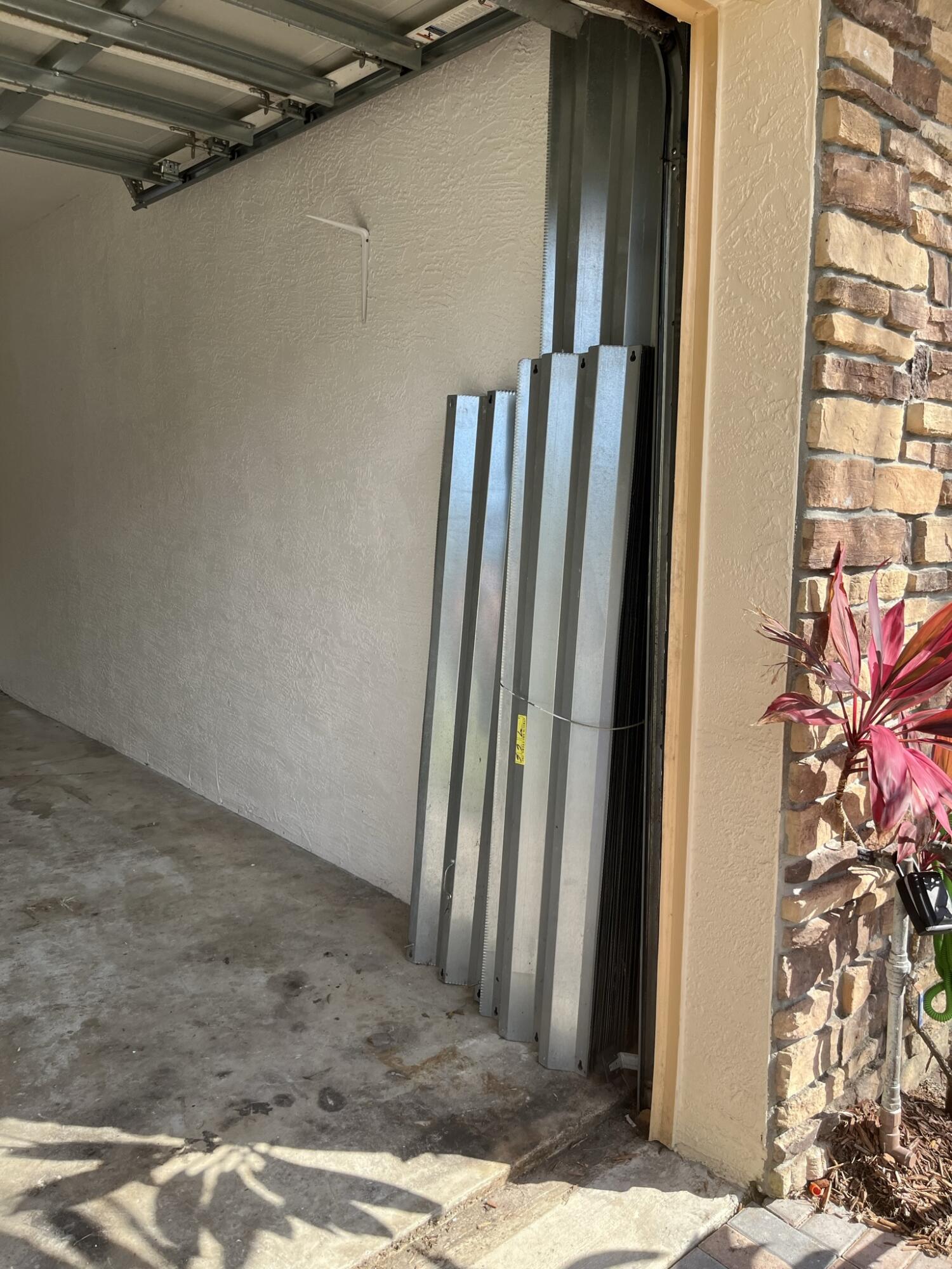 Undisclosed Address Stuart, FL 34997 - Photo 11 of 12 Storm Shutters