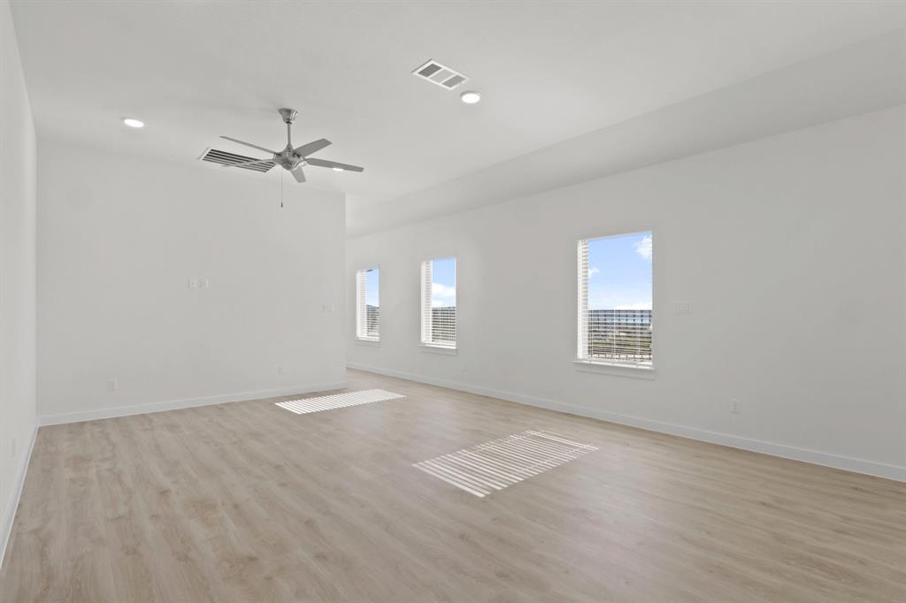 8336 Coastal Lane Pilot Point, TX 76258 - Photo 6 of 17 a view of an empty room with a window