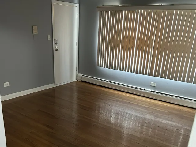 a view of wooden floor and staircase
