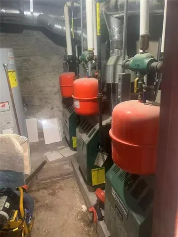 a refrigerator freezer sitting inside of a kitchen