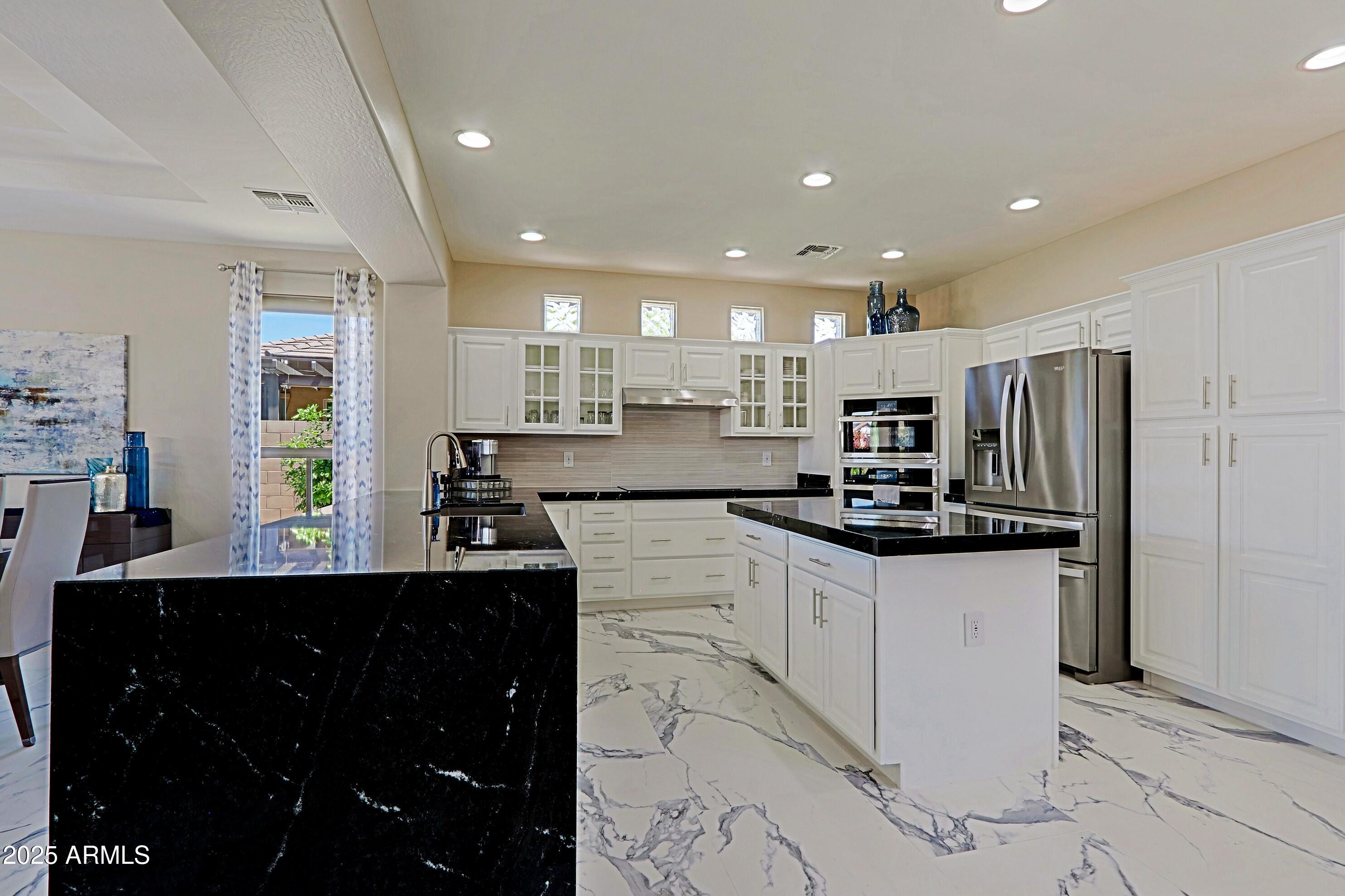16370 West Granada Road Goodyear, AZ 85395 - Photo 17 of 61 Granite with Waterfall Edge