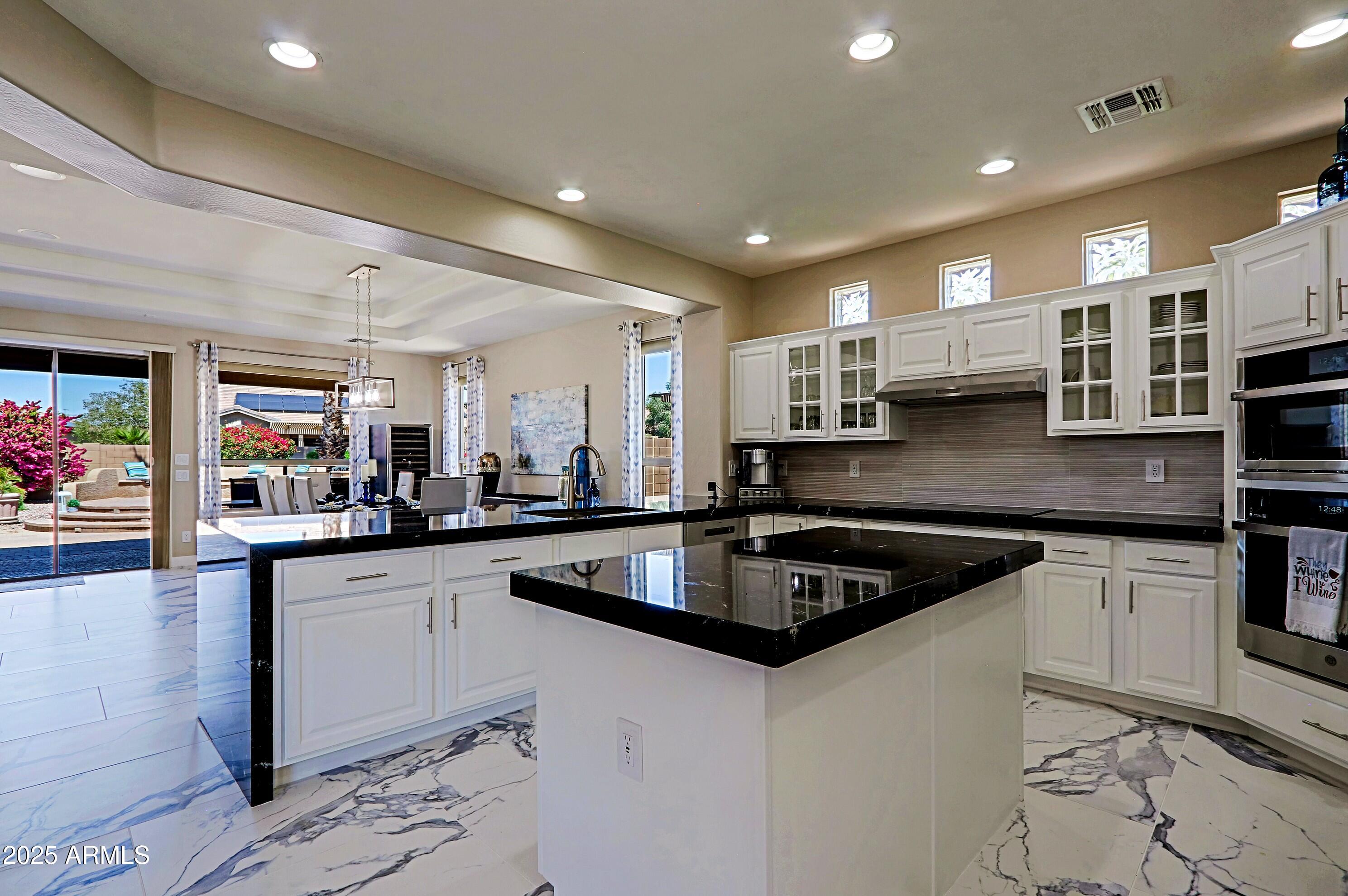 16370 West Granada Road Goodyear, AZ 85395 - Photo 18 of 61 Kitchen view to Backyard