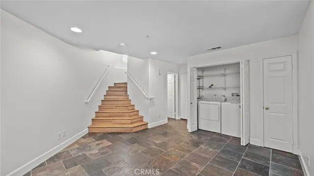a view of a hallway with closet area