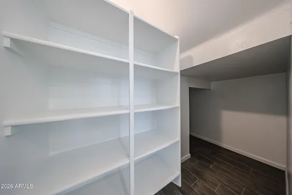 a view of an empty walk in closet