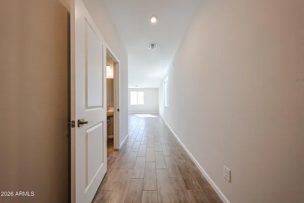 a front view of a house with parking space