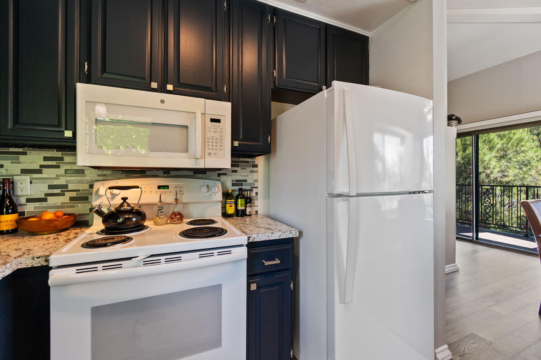 426 Ridgecrest Trail, Unit 223 Redding, CA 96003 - Photo 21 of 59 a kitchen with stainless steel appliances a refrigerator a sink a stove and cabinets