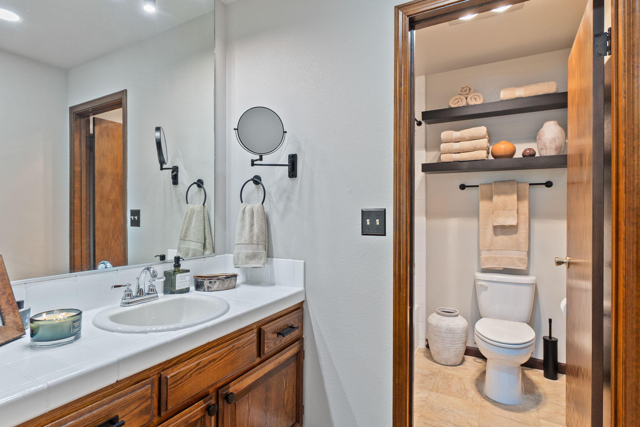 426 Ridgecrest Trail, Unit 223 Redding, CA 96003 - Photo 26 of 59 a bathroom with a granite countertop toilet sink and shower