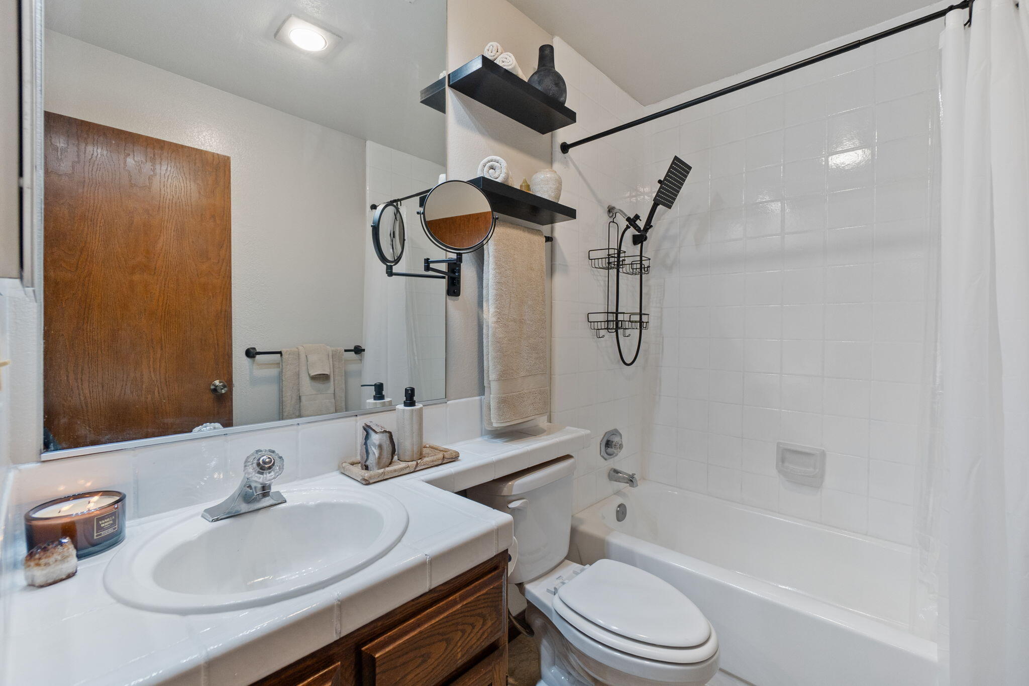 426 Ridgecrest Trail, Unit 223 Redding, CA 96003 - Photo 31 of 59 a bathroom with a sink toilet tub and shower