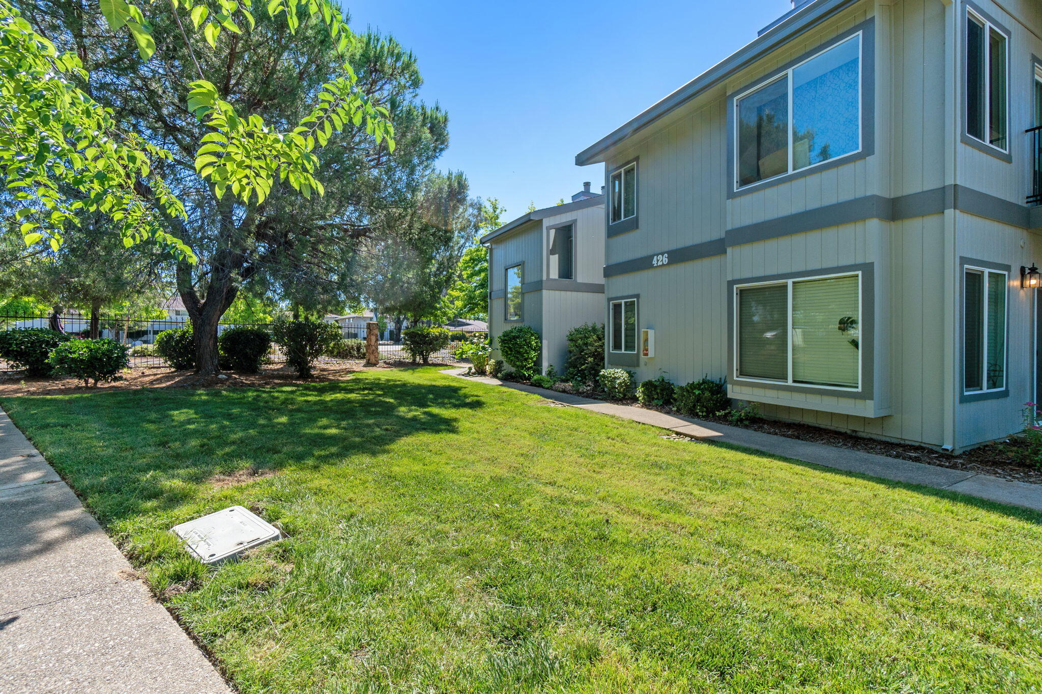 426 Ridgecrest Trail, Unit 223 Redding, CA 96003 - Photo 39 of 59 a view of a house with a yard